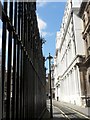 TQ3181 : City of Westminster: ironwork and stonework in Bell Yard by Chris Downer