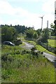 Wind turbine at isolated farmstead