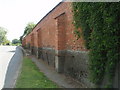 TL0992 : Exterior Of Elton Hall Walled Garden by Michael Trolove