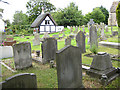 In the churchyard of St Lawrence, Swindon Village