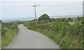 Power lines crossing the road near Pant Eithinog