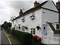 Weatherboard clad houses on New Pond Road