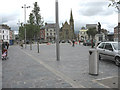 Hey presto! at a cost of ?2.5 million Caernarfon town centre has a glorified slate paved car park