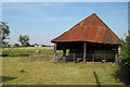 Rusty-roofed barn, Uckington