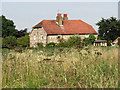 Attractive large flint and brick house