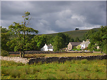 NY6208 : Pasture and cottages, Orton by Andrew Smith