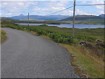 NN4357 : On the station road with Loch Eigheach in the middle ground by Pip Rolls