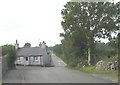 SH5080 : A narrowing of the road on the northern outskirts of the village of Llanbedrgoch by Eric Jones