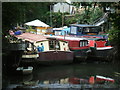 Moored boats at low tide.