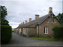 NT9349 : Row of cottages near Horncliffe Mains by Richard Law