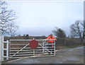 Manually operated level crossing