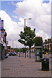 TQ2992 : Pavement, Bowes Road, London N11 by Christine Matthews