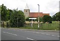 Great Wakering: Church of St Nicholas and signpost to Foulness