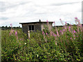 Small building beside railway line