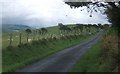 Ridge lane rising beyond Cefn Llwyd