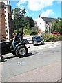 Tractor passing Chapel House at Dunster