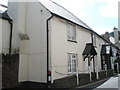 Cream coloured cottages in Porlock High Street