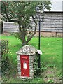 SU0611 : Edmondsham: postbox № BH21 115 and old post office sign by Chris Downer
