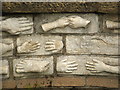 NS5958 : A wall of hands and feet by Lairich Rig