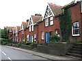 Terraced houses on Briston Road (B1354)