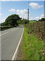 SO2393 : View of A489 Trunk road. by Tim Marshall