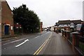 Road past Holy Trinity Church, Abridge, Essex