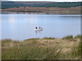 SH9856 : Fly fishing on the Brenig reservoir by Eirian Evans
