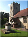 Tower, porch and churchyard monument at Offton Church