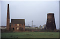 SE7741 : Windmill stump and chimney, Seaton Ross by Chris Allen