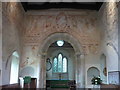 Clayton church interior showing a section of the early medieval wall paintings