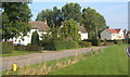 Houses in Alpheton and a stretch of the old road