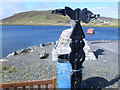 Signpost showing distances to places on Shetland