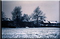 SK4093 : School field in winter by Alan Hawkes
