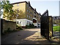 View from Osterley Gardens entrance to Comer Crescent