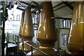 Copper stills inside Jura distillery